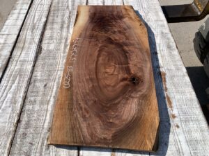 figured walnut panel, door panels, drawer panels