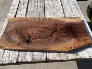 figured walnut panel, door panels, drawer panels