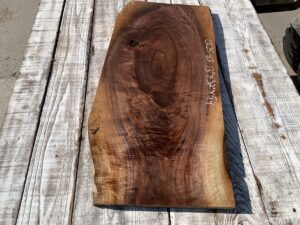 figured walnut panel, door panels, drawer panels