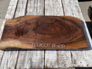 figured walnut panel, door panels, drawer panels