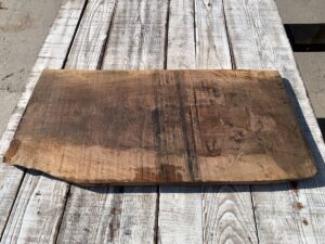 figured walnut panel, door panels, drawer panels